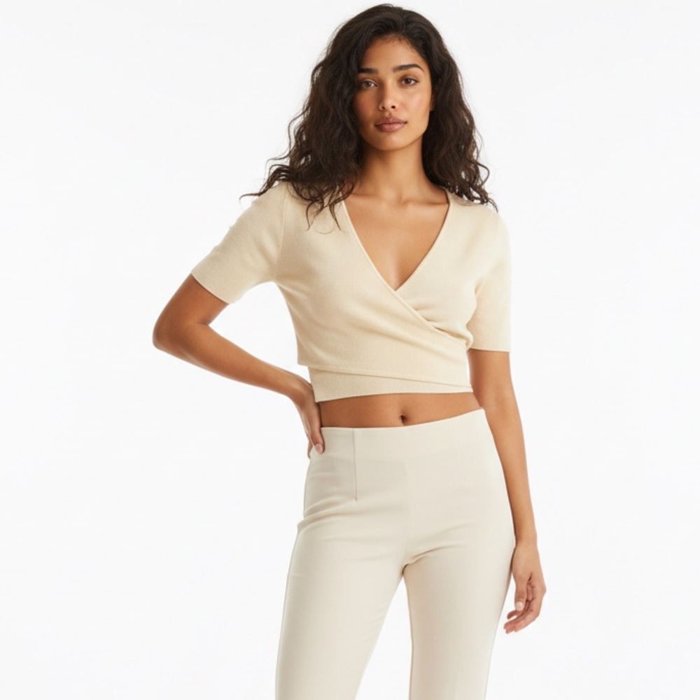 Aritzia Babaton Sculpt Knit Cross Front Crop Top in a light yellow. Size XS LN